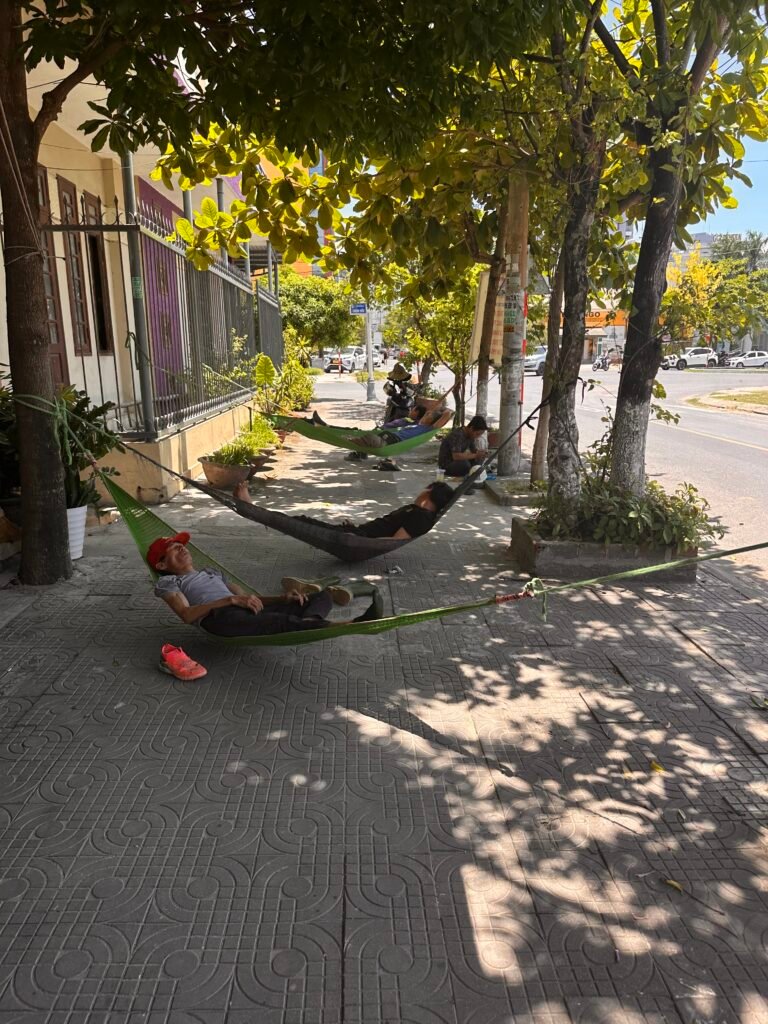 people sleeping in sidewalk in Da Nang, Vietnam